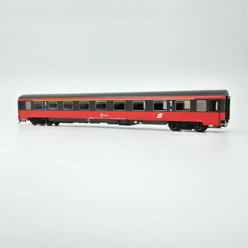 ACME 52581 - Carrozza tipo Amz ÖBB di 1°cl. con carrelli SGP in livrea Grigio Antracite / Rosso Fuoco - H0